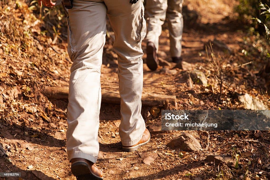 People hiking with professional pants.